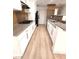 Galley-style kitchen featuring stainless appliances and updated cabinetry at 2200 S Fort Apache Rd # 2123, Las Vegas, NV 89117