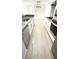 Modern kitchen featuring white cabinetry, stainless appliances, and granite countertops at 2200 S Fort Apache Rd # 2123, Las Vegas, NV 89117