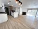 Bright open-concept living room features a fireplace and sliding glass doors at 2200 S Fort Apache Rd # 2123, Las Vegas, NV 89117
