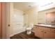 Bright bathroom featuring a tub and shower combination, toilet, and vanity with a sink at 231 W Horizon Ridge Pkwy # 314, Henderson, NV 89012