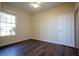 Bedroom with a window and wood-look floors with a view to the garden at 231 W Horizon Ridge Pkwy # 314, Henderson, NV 89012