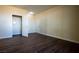 Bedroom with wood-look floors with doors to the walk-in closet and the hallway at 231 W Horizon Ridge Pkwy # 314, Henderson, NV 89012