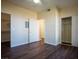 Spacious bedroom with wood-look floors, two closets with doors and an entry door at 231 W Horizon Ridge Pkwy # 314, Henderson, NV 89012