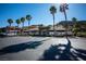 Community clubhouse with palm trees, landscaping, and ample parking at 231 W Horizon Ridge Pkwy # 314, Henderson, NV 89012