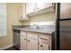 Well-maintained kitchen with modern appliances, granite countertops, and wooden cabinets at 231 W Horizon Ridge Pkwy # 314, Henderson, NV 89012