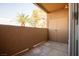 Outdoor patio area with stucco railing and a storage closet at 231 W Horizon Ridge Pkwy # 314, Henderson, NV 89012
