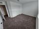 Bedroom with carpet, a double door closet, and neutral paint at 247 Desoto Falls St, Indian Springs, NV 89018