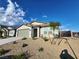 Charming single-story home featuring a two-car garage, xeriscaped front yard and neutral paint at 247 Desoto Falls St, Indian Springs, NV 89018