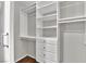 Bright walk-in closet with custom shelving and drawers at 2714 Bridgepointe Dr, Las Vegas, NV 89121