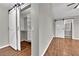 Walk-in closet featuring custom shelving and barn doors at 2714 Bridgepointe Dr, Las Vegas, NV 89121