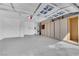 Spacious two-car garage boasts built-in cabinets and plenty of storage space at 2714 Bridgepointe Dr, Las Vegas, NV 89121