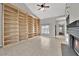 Open living area with a cozy fireplace and ample natural light at 2714 Bridgepointe Dr, Las Vegas, NV 89121