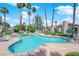 Inviting community pool with clear blue water and ample lounge space at 2714 Bridgepointe Dr, Las Vegas, NV 89121