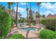 Relaxing spa with a lounge area surrounded by lush landscaping at 2714 Bridgepointe Dr, Las Vegas, NV 89121