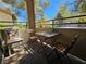 Comfortable balcony featuring an outdoor table and seating for enjoying the outdoor view at 3145 E Flamingo Rd # 2005, Las Vegas, NV 89121
