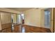 Bedroom with mirror closet doors and wood laminate floors at 3145 E Flamingo Rd # 2005, Las Vegas, NV 89121