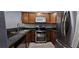 Well-lit kitchen featuring stainless steel appliances and granite countertops at 3145 E Flamingo Rd # 2005, Las Vegas, NV 89121