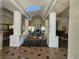 Lobby featuring tile flooring, columns, and seating at 3145 E Flamingo Rd # 2005, Las Vegas, NV 89121