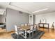 Dining room with table seating for eight, complemented by stylish decor and hardwood flooring at 3750 Las Vegas Blvd # 3008, Las Vegas, NV 89158