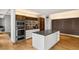 Contemporary kitchen with stainless steel appliances, center island, and sleek cabinets at 3750 Las Vegas Blvd # 3008, Las Vegas, NV 89158