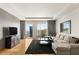 Inviting living room featuring a comfortable sectional couch, city views, and modern decor at 3750 Las Vegas Blvd # 3008, Las Vegas, NV 89158