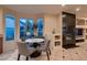 Cozy breakfast nook featuring a fireplace, media center, and seamless flow to the kitchen at 379 Fynn Valley Dr, Las Vegas, NV 89148
