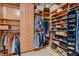 Organized walk-in closet with custom shelving, drawers, and ample storage space at 379 Fynn Valley Dr, Las Vegas, NV 89148
