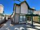 Attractive two-story home with a private patio and pergola under a clear blue sky at 4037 Chalfont Ct, Las Vegas, NV 89121