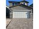 Charming two-story home with a two-car garage and beautifully paved driveway at 4145 Texas Lilac Ave, Las Vegas, NV 89139