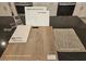 Selections for the kitchen showing white cabinets, sleek chrome faucet, and quartz countertop at 4145 Texas Lilac Ave, Las Vegas, NV 89139