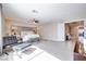 Spacious bedroom with plush carpet, a decorative headboard, and an open layout for easy movement at 4211 Saxton Green Ave, Las Vegas, NV 89141