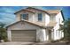 Beautiful two-story home featuring neutral color palette, tile roof, two-car garage and low maintenance desert landscaping at 4282 Yucca Brevi Ave, Las Vegas, NV 89139