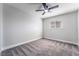 The bedroom has gray carpet and a window for lots of natural light at 4857 Fairfax Ave, Las Vegas, NV 89120