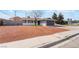 Charming single-story home featuring gray paint, desert landscaping, and a two-car garage at 4857 Fairfax Ave, Las Vegas, NV 89120
