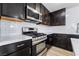 Close up of kitchen featuring stainless steel appliances and white countertops at 4857 Fairfax Ave, Las Vegas, NV 89120