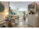 Open-concept living space showcases hardwood floors, bright natural light, and stylish contemporary furnishings at 5317 Clover Blossom Ct, North Las Vegas, NV 89031