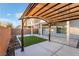 Backyard patio with a pergola and artificial turf at 5745 Becklow Gardens Ave, Las Vegas, NV 89141