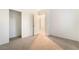 A bedroom with an open doorway and a closet with sliding doors at 5745 Becklow Gardens Ave, Las Vegas, NV 89141