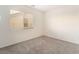 A carpeted bedroom with a window and neutral walls at 5745 Becklow Gardens Ave, Las Vegas, NV 89141