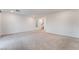 Large open living room with wall to wall carpet, neutral walls, and recessed lighting for modern living at 5745 Becklow Gardens Ave, Las Vegas, NV 89141