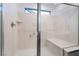 Accessible shower with grab bars, a built-in bench, and a sleek glass enclosure at 5745 Becklow Gardens Ave, Las Vegas, NV 89141