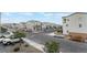 Street view showing a neighborhood featuring well-maintained homes and landscaped surroundings at 5745 Becklow Gardens Ave, Las Vegas, NV 89141