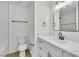 Clean bathroom featuring a modern vanity, updated fixtures, and a tiled shower at 6248 Spanish Moss Ave, Las Vegas, NV 89108