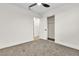 Bedroom featuring a ceiling fan, carpet, and closet for storage at 6248 Spanish Moss Ave, Las Vegas, NV 89108