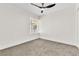 Bedroom with carpet, ceiling fan and window with blinds at 6248 Spanish Moss Ave, Las Vegas, NV 89108