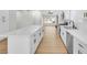Bright kitchen with white cabinets, stainless steel appliances, and a large island at 6248 Spanish Moss Ave, Las Vegas, NV 89108