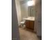 Modest bathroom with tiled flooring, a standard vanity, toilet, and shower with glass doors at 6868 Sky Pointe Dr # 1034, Las Vegas, NV 89131
