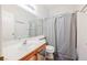 Clean bathroom with vanity, modern lighting, and shower with curtain for a functional space at 6901 Squaw Mountain Dr # 201, Las Vegas, NV 89130
