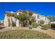 Charming condo featuring a stucco exterior with landscaped grounds, perfect for relaxed living at 6901 Squaw Mountain Dr # 201, Las Vegas, NV 89130