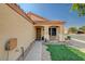 Inviting single-story home with a covered front porch and desert landscaping at 713 Salt Flats Cir, Henderson, NV 89011